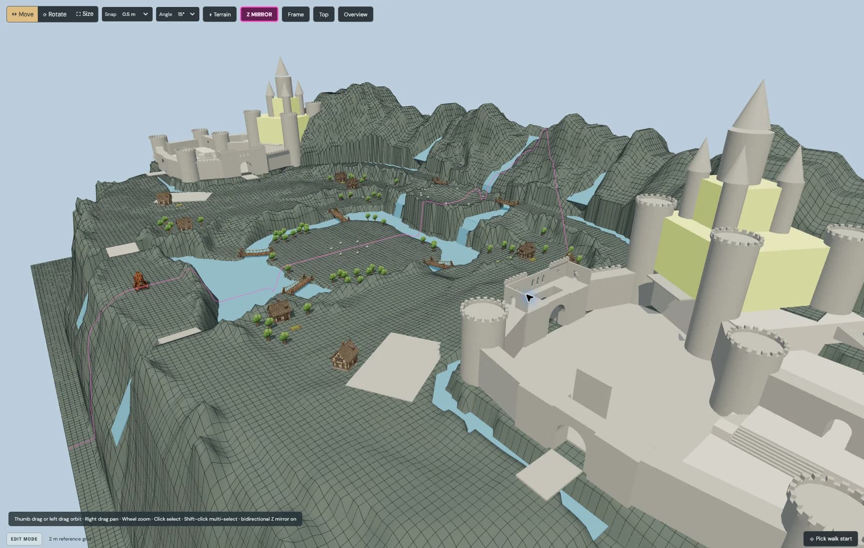 The world editor shows two rival castles across a mountainous valley, with villages, bridges, and winding waterways.